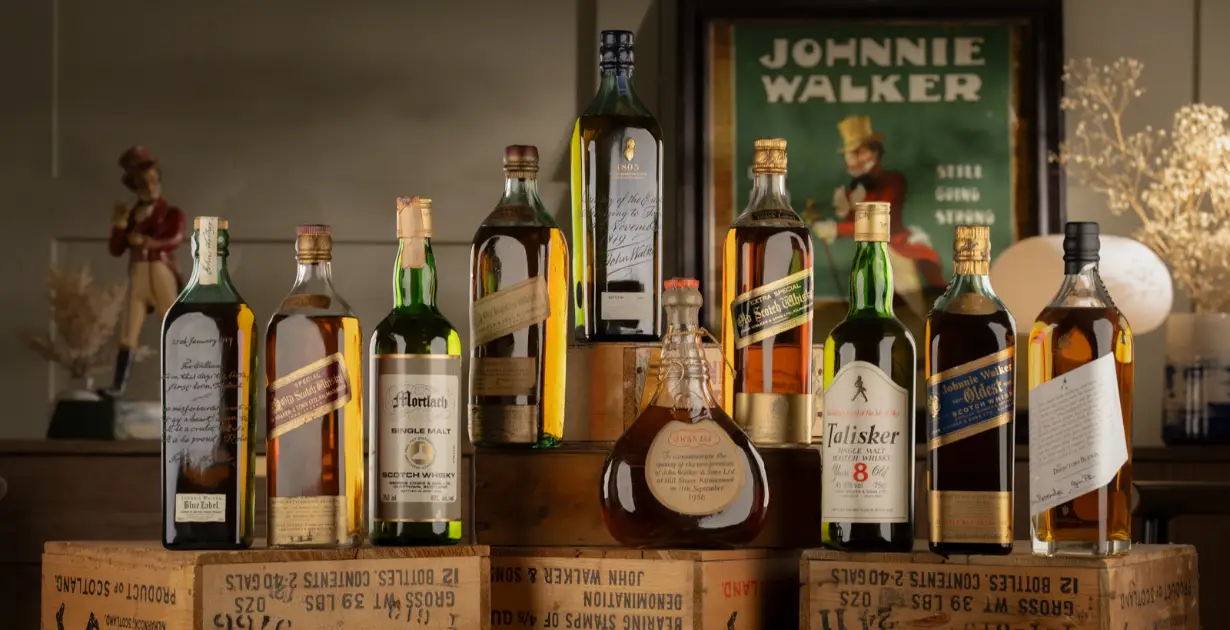 Subasta Johnnie Walker Whisky Auctioneer
